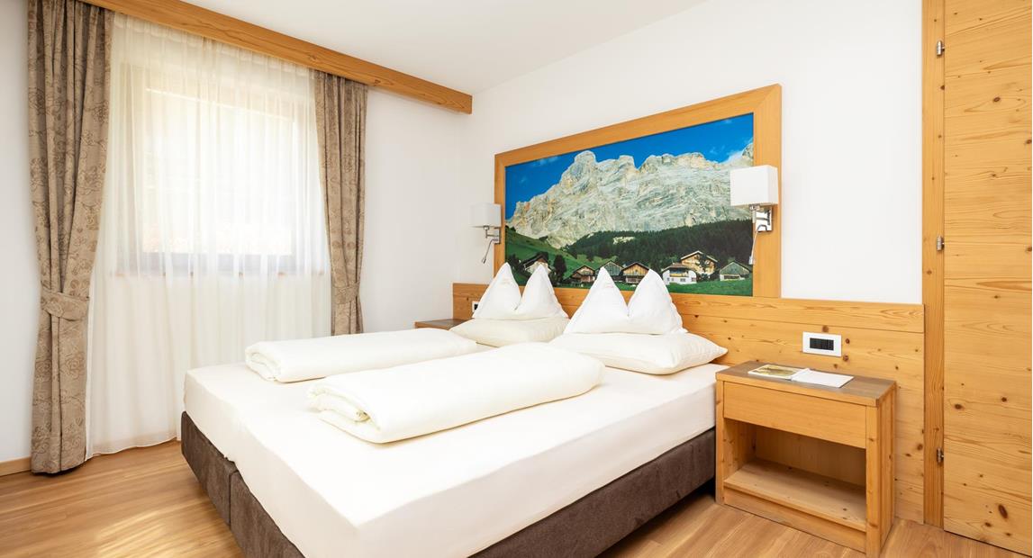 Schlafzimmer - Ferienwohnung Soplà