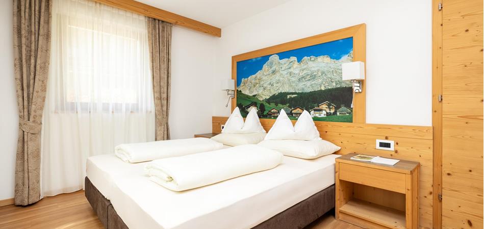 Schlafzimmer - Ferienwohnung Soplà